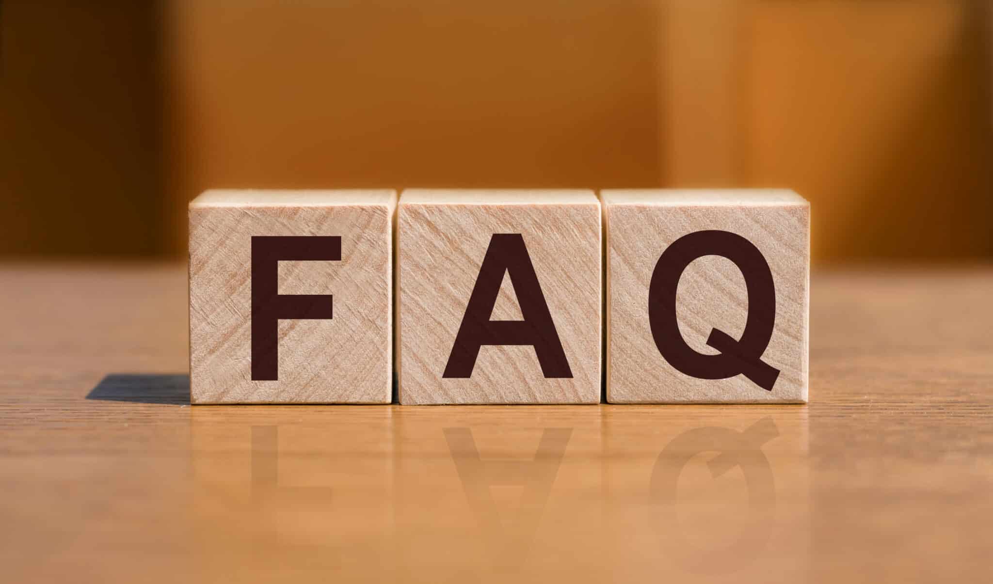 HVAC Load FAQ sign made of wooden cubes on an table.